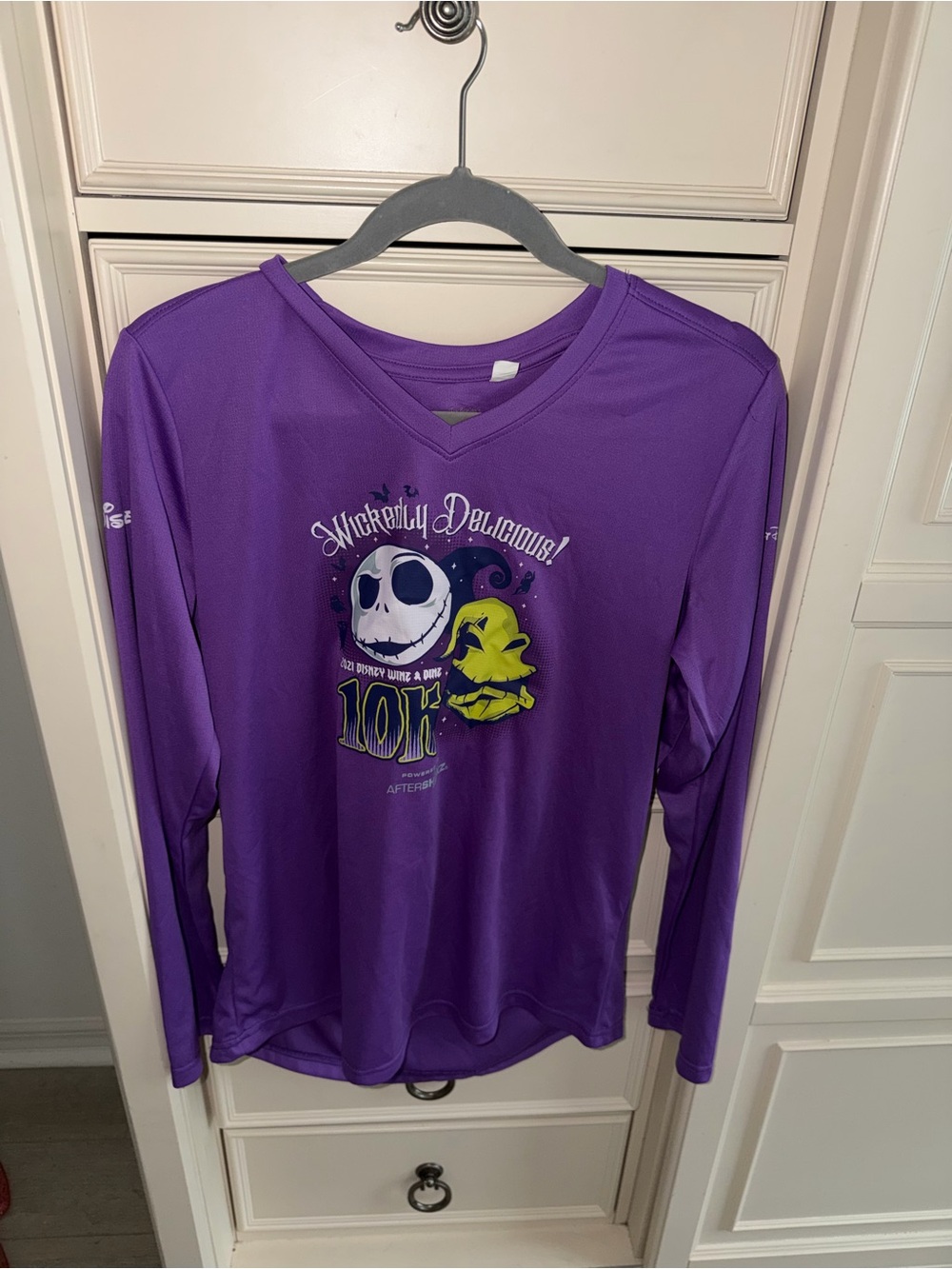 Run Disney woman's Purple Long-Sleeve Graphic V-Neck Top - Wickedly Delicious